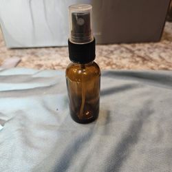 Stay With Me Magickal Mist" spray bottle, likely used for spiritual or aromatherapy purposes 1 Oz