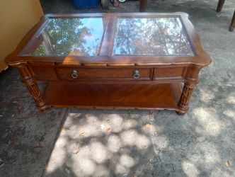 Solid wood coffee table with glass top