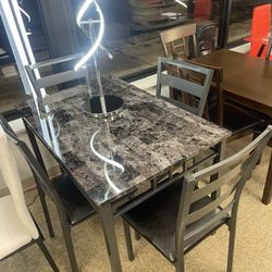 Table and 4 chairs 🪑 brand new in box for easy pick up or same day delivery 🚚   Mattress +   601 w lake st Addison il 60101                  Busines