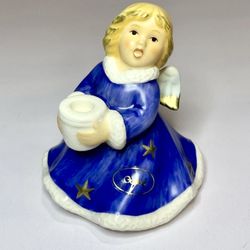 The Vintage Goebel Purple Dress Angel Candle Holder Figurine is a small, asymmetrical ceramic and porcelain figurine from 1966. Handarbeit, this candl