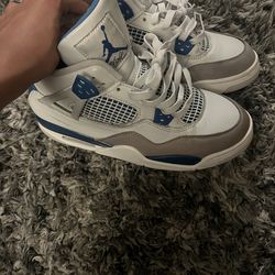 Military Blue Jordan 4s.