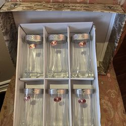 set of six decorative water or juice glasses with a silver-tone