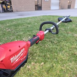Milwaukee
M18 Fuel 18V Brushless Cordless Battery Powered Quik-Lok Power Head with Brush Cutter Attachment