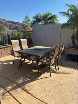 Yard table and 4 chairs $75
