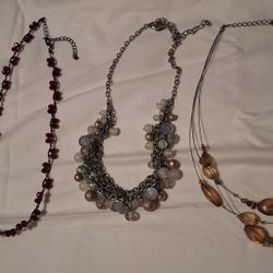 Three Necklaces And A Bracelet
