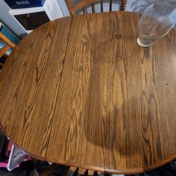 Wooden Dining Room Table. 4 Chairs Included
