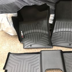 WeatherTech auto floor mats. 