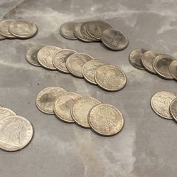 Estate Find 32 Silver Dollar coins from 1(contact info removed) Coins are Magnetic so I assume there FAKE.