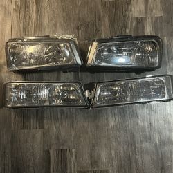 Headlights Smoked Black Chrome 2003 to 2006 Chevy Silverado/Cateye trucks 