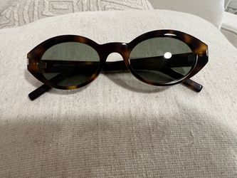 Saint Laurent SL 567 oval sunglasses in havana acetate