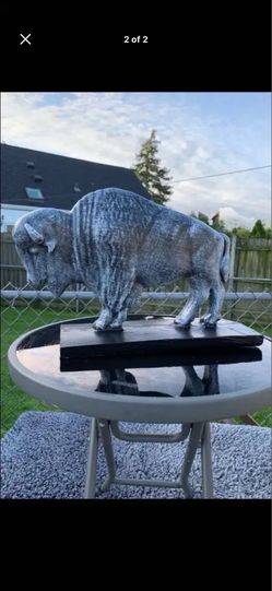 The old gray buffalo statue