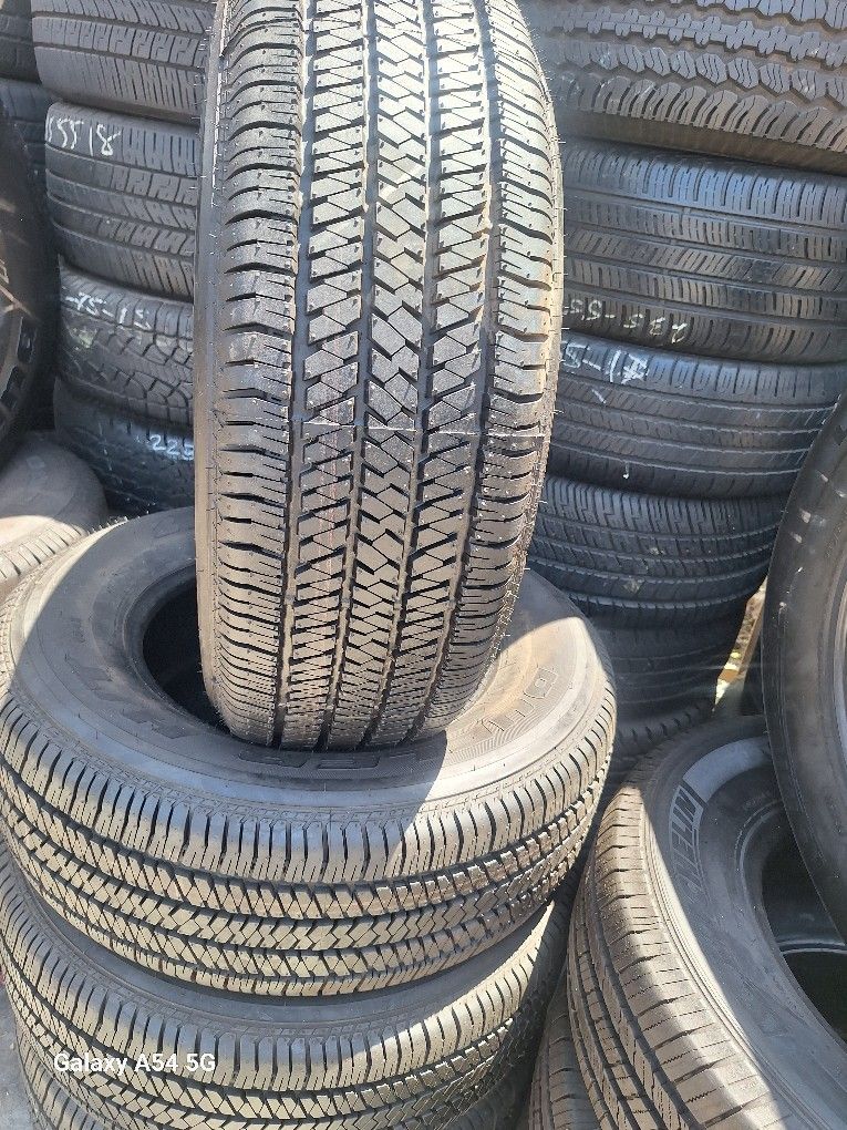 265/65/17/ BRIGESTONE $300 SEMI NEW FOUR TIRES