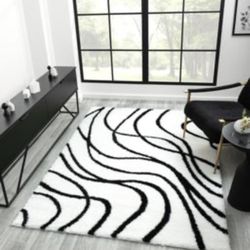 8/10 Brand New Black And White Rug 