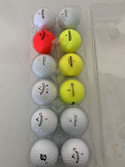 Golf Balls Assorted In Mint Condition.