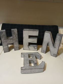 Galvanized metal letters 6 to 7 in.  $2 each.