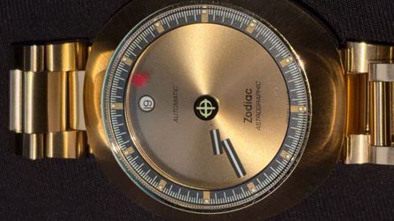 007/182 limited edition automatic was $1500 Zodiac Astrographic Automatic Gold-Tone Watch