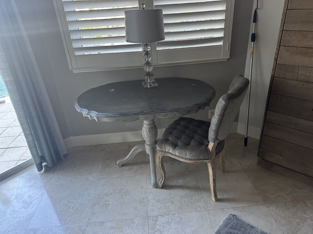 Gray Table Chair And Chair With Lamp
