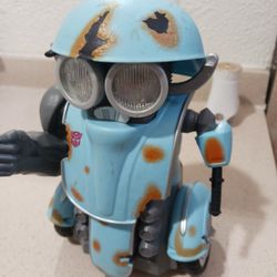 Robot autobot sqweks Transformers The last King son's & lights. Good Condition.