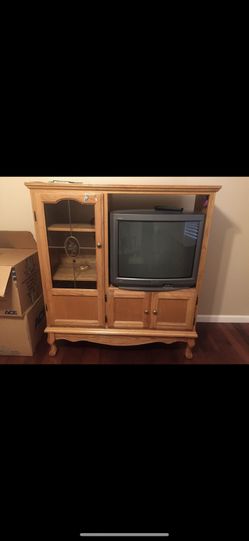 Older tv and entertainment center