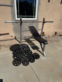 Bench press with 233lbs of Olympic weights and 7ft bar