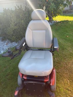 Electric wheelchair with charger