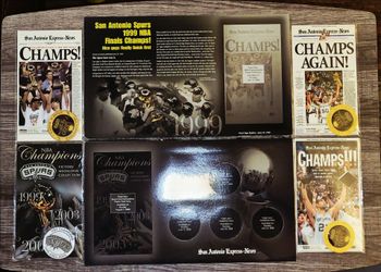 San Antonio Spurs championship memorabilia from the San Antonio Express-News, featuring souvenir front-page reprints and Victory Medallion collection