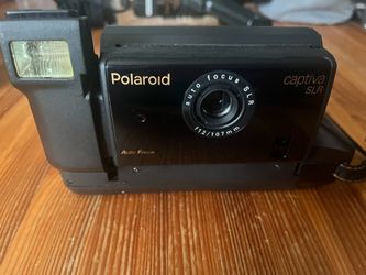 Vintage Polaroid Captiva SLR Auto Focus Instant Camera 95 Film 107mm UNTESTED