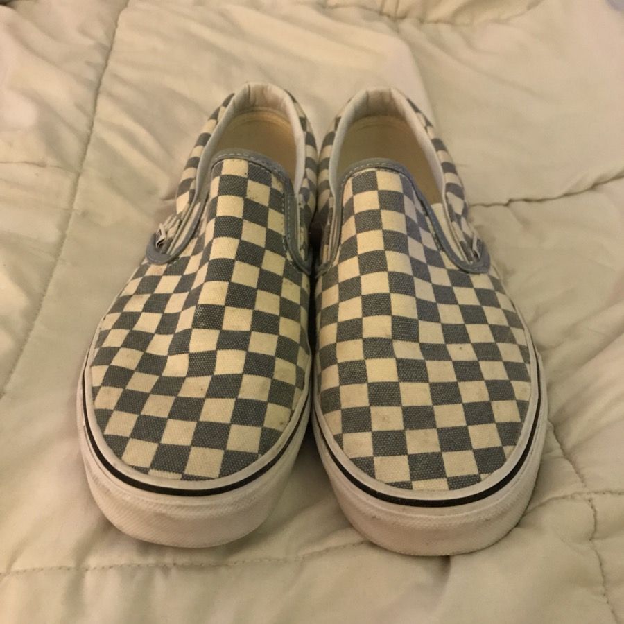 Pair of white-and-blue slip on shoes