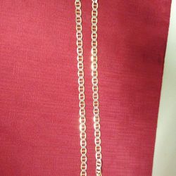 Sterling silver and 8 k Real Gold chain.