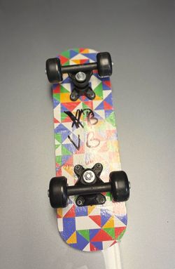 Mini Skateboard with Colorful Graphic Deck