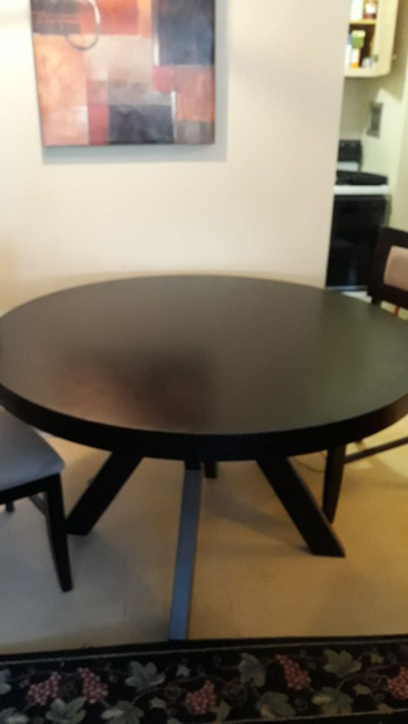 Dining room table with 4 matching chairs