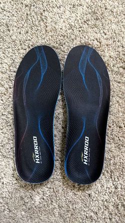 black athletic shoe insoles with blue wave patterns and white "HXRROD" branding.
