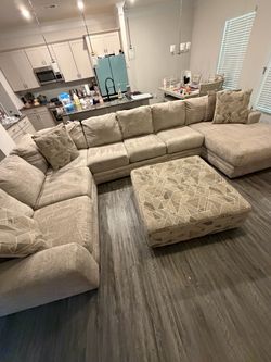 Large Beige Sectional Sofa with Ottoman