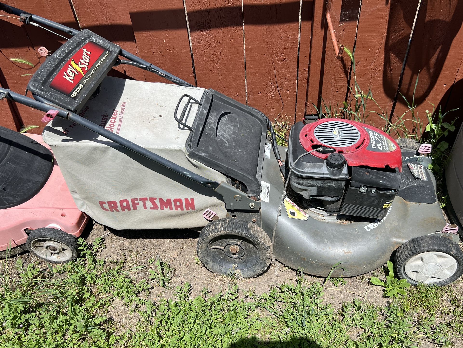 Craftsman Gas And Black & Decker Electric Mowers