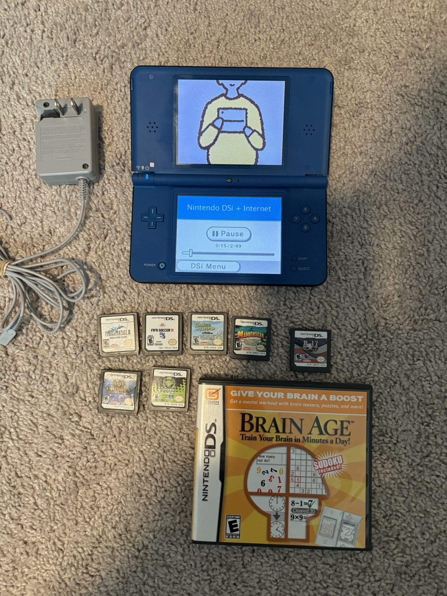 Nintendo DSi XL + 8 Games (hablo Espanol)