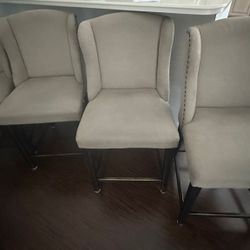 Bar Stools or High Chairs all 4 Fabric Beige color… Delivery Extra