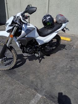 One motorcycle, air-cooled, approximately 295 lbs. Good condition. No test drives, and cash only no trades.