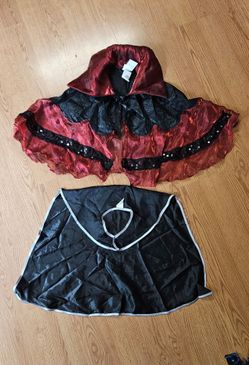 Halloween costume: The black size 3-6 years, the red: one size fit most.