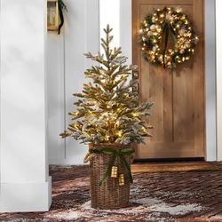 Member's Mark 48" Pre-Lit Flocked Topiary in Woven Basket $69.99