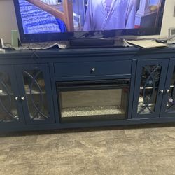 A Tv Stand & Entertainment Center