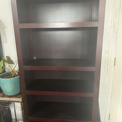  Beautiful dark wood bookshelf available!