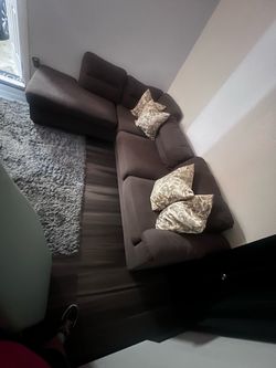 Brown couch with Ottoman