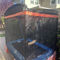Trampoline with swing