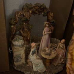 Antique Tea Garden Figurine