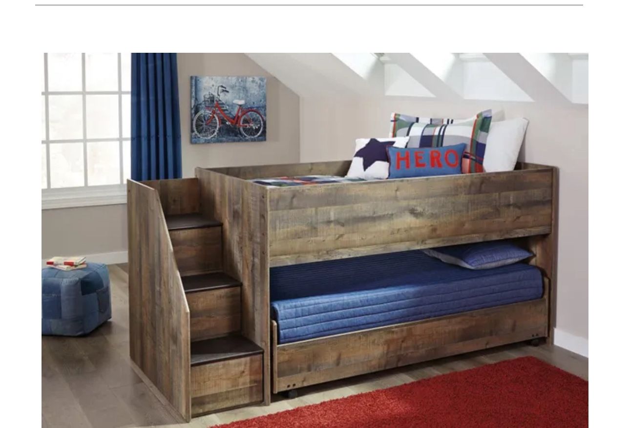 Signature Design by Ashley® Trinell Rustic Brown Youth Twin Loft Bed with Pull-out Caster Bed