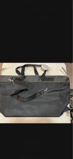 CA. NEW WITH TAGS L’HOMME 26x14” UNISEX BLACK WEEKENDER BAG
