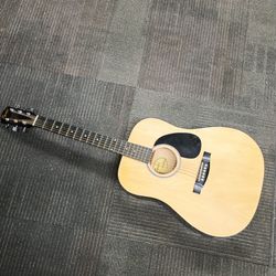Adult size acoustic guitar