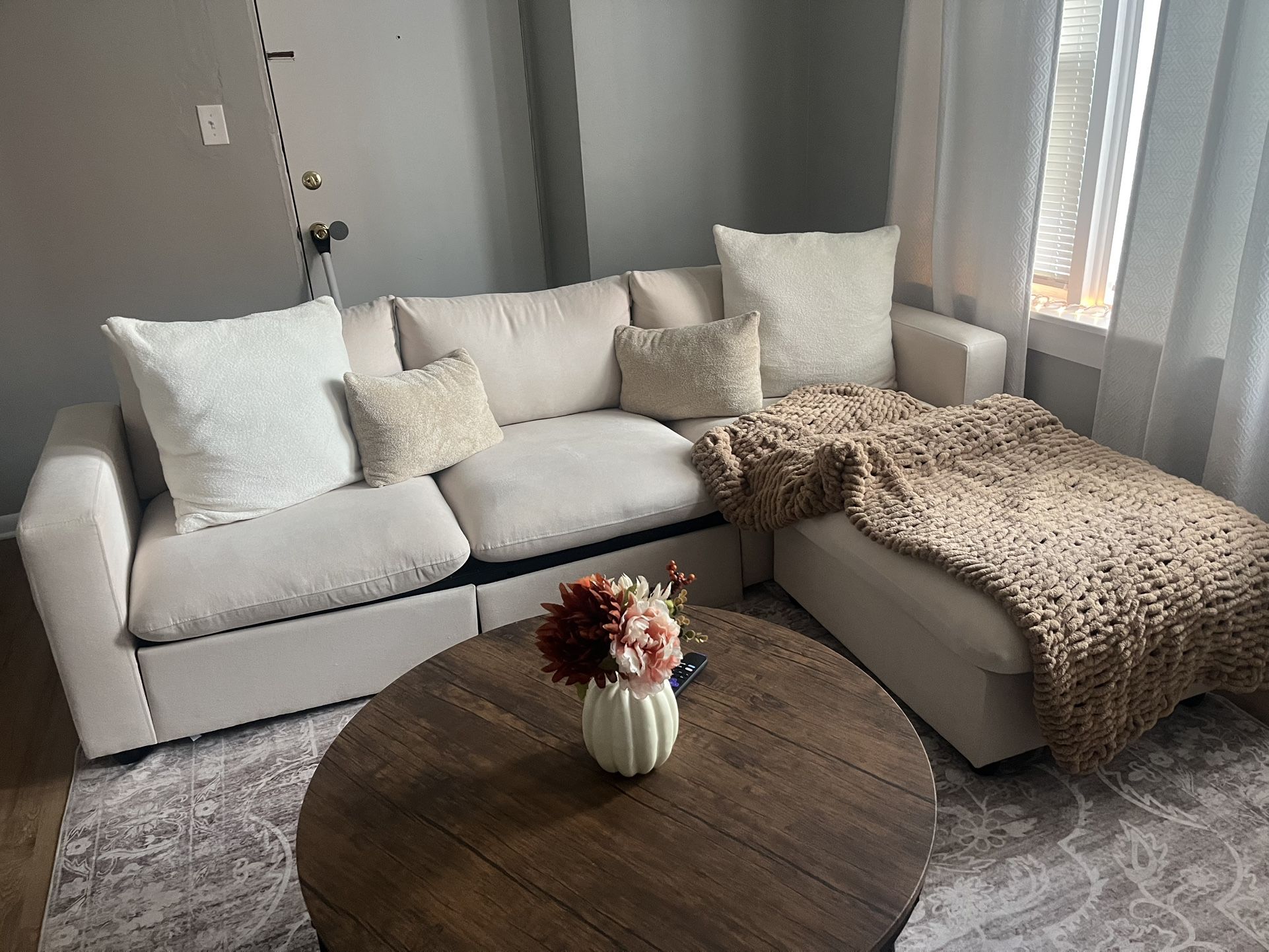 Beige Sofa With Movable Ottoman