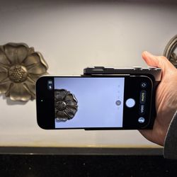 Padded Handy iPhone Grip Gives iPhone No-Slip Hold with Tripod Mount on Bottom