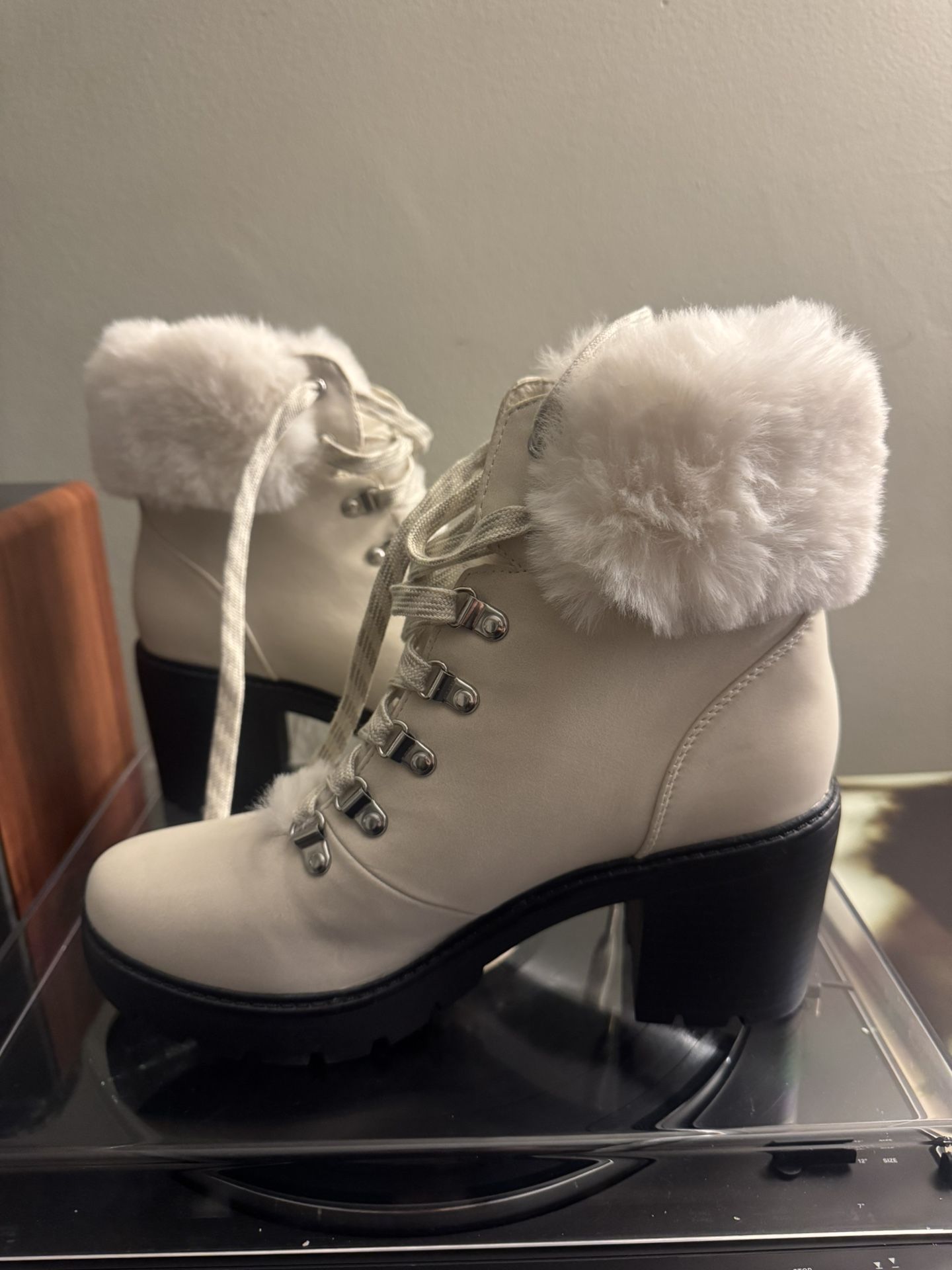 White fur boots